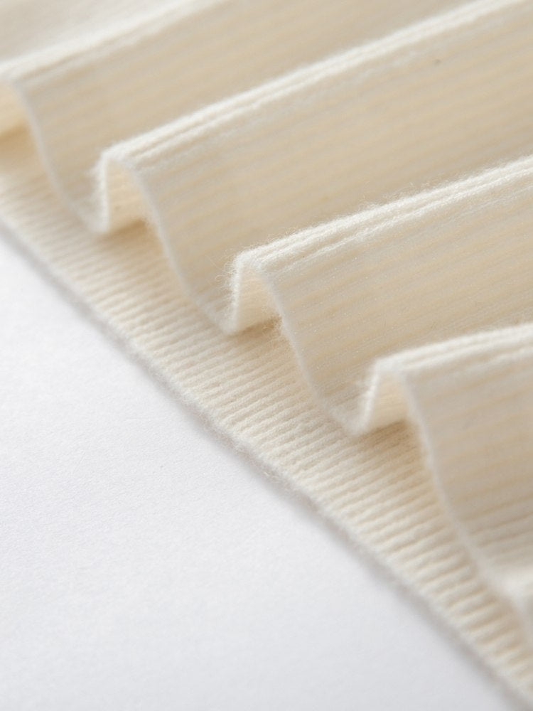 Omirelle - Sleeveless Cashmere Polo Vest | The Cashmere Studio